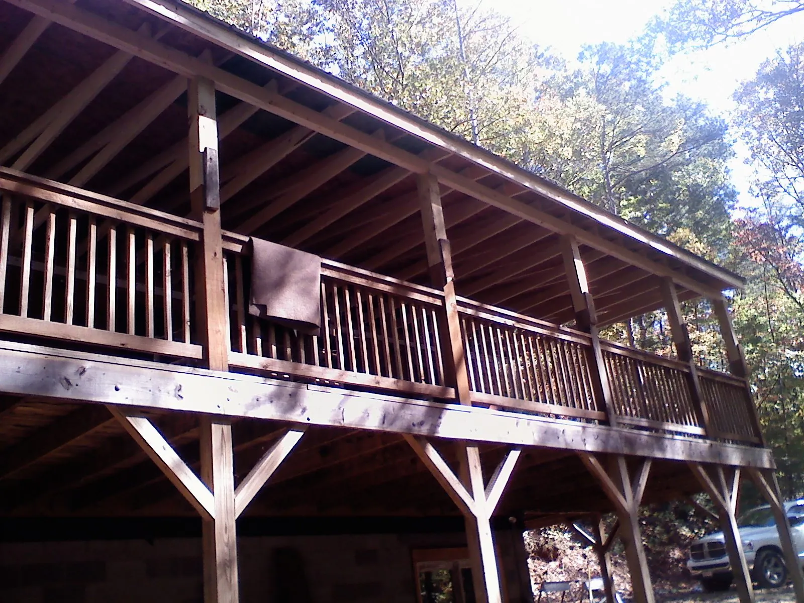 Timber framing under a new elevated porch and deck — Roof Leak Repair in Fair Haven by Roofing Brothers